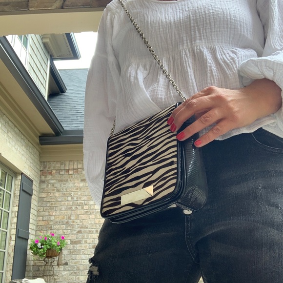Zebra and black crossbody with silver chain strap. New condition. - Picture 6 of 6